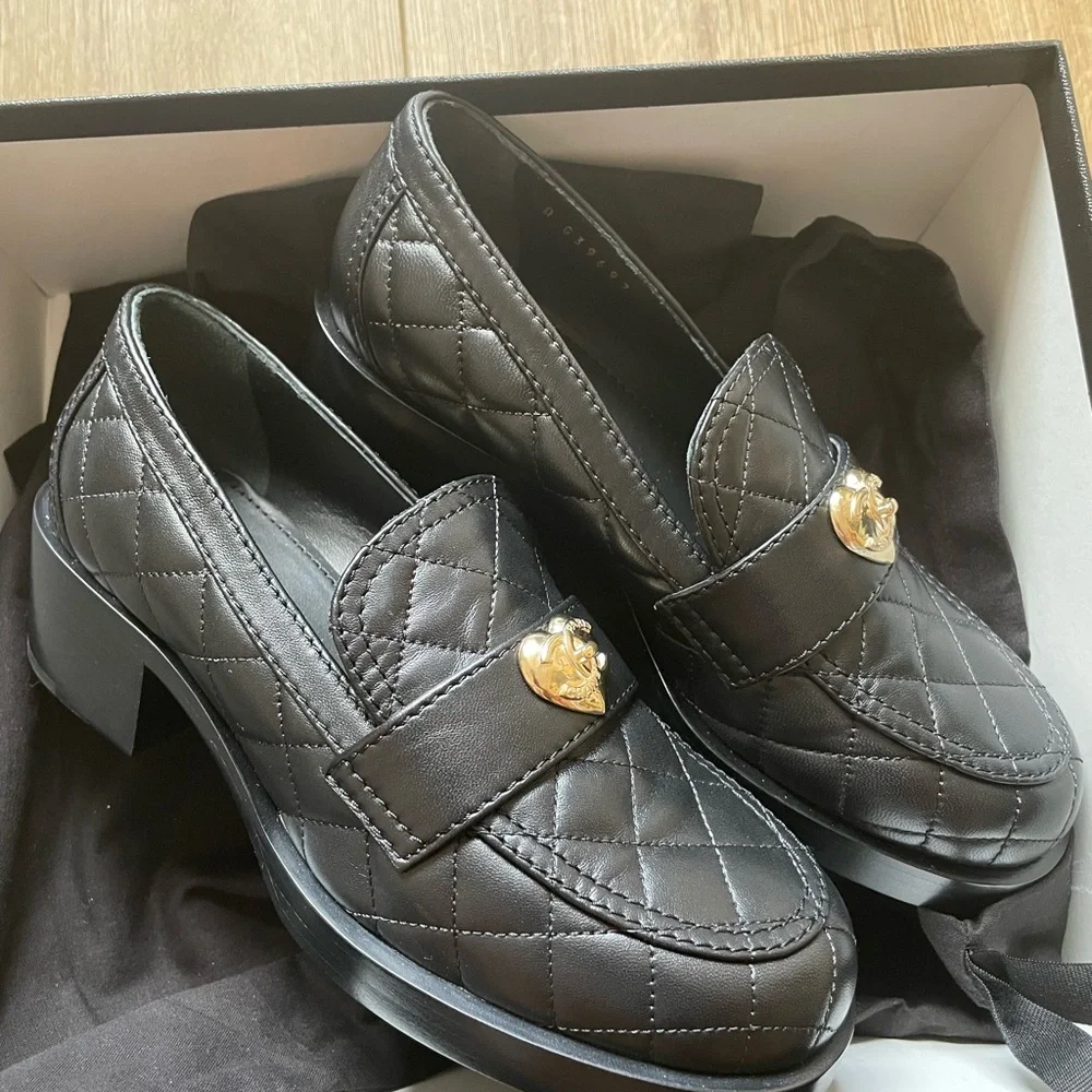 CHANEL Black Quilted Loafers with Gold Accent - Picture 3 of 6